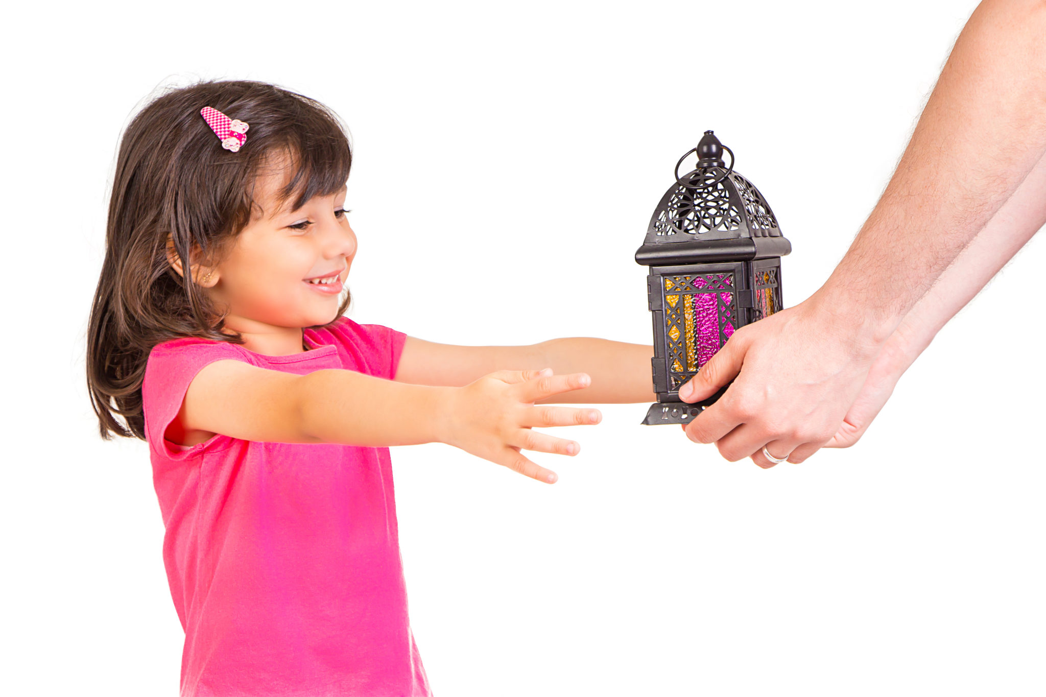 A girl receives a lantern for Ramadan. (iStock photo)