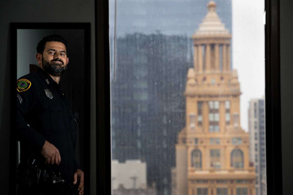 Houston Police Department officer Danish Hussain poses for a photograph inside the department's headquarters on Thursday, April 29, 2021, in Houston. The police department makes some accommodations for officers who are fasting during Ramadan, including letting them take a break right at sundown to eat and drink. HPD also has its first assistant chief who is Muslim, and has created a liaison position to the Muslim community.