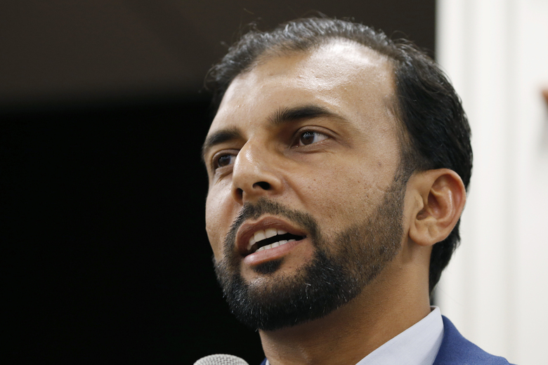 FILE – This Oct. 8, 2019, file photo shows Democratic candidate for the 28th district for the Virginia Senate, Qasim Rashid, in Fredericksburg, Va. A federal appeals court on Friday, June 4, 2021 upheld the conviction of a North Carolina man who posted an anonymous threat on social media to lynch Qasim Rashid, a Muslim-American political candidate from Virginia.. (AP Photo/Steve Helber, File)